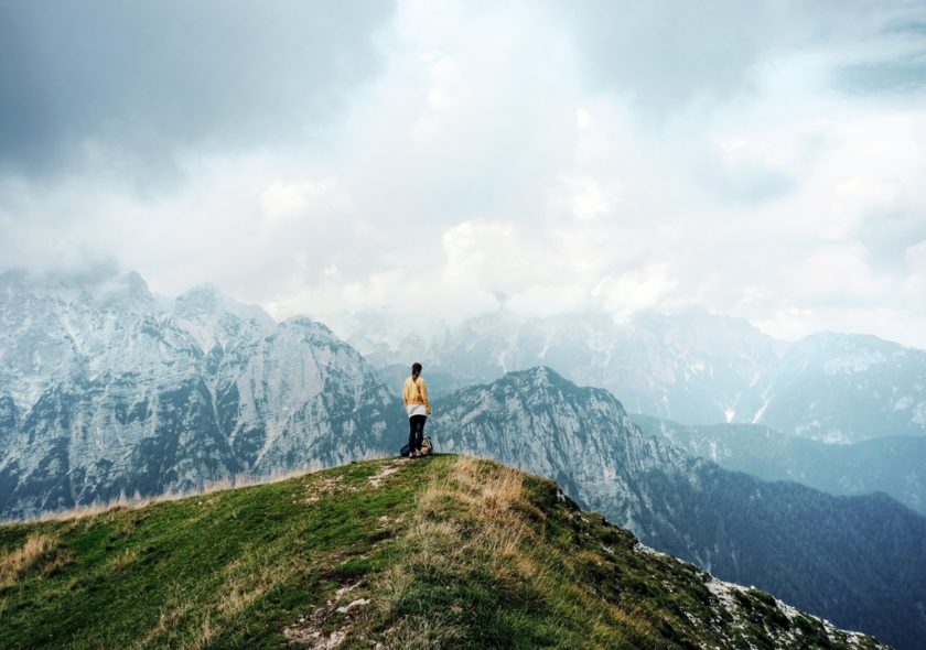 Woman on mountaintop in autumn